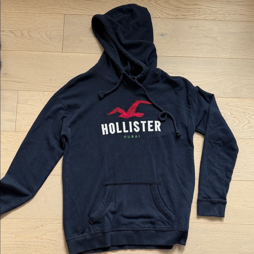Hollister Men's Navy Hoodie with Red Logo